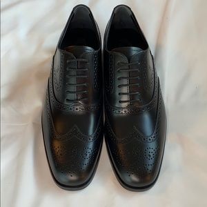 Tod’s Black Leather Lace-Ups